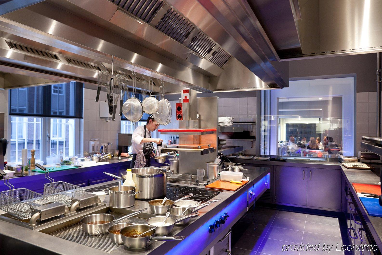 Het Arresthuis Roermond Restaurant photo A commercial kitchen